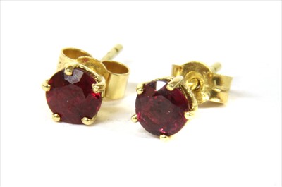 Lot 48 - A pair of 18ct gold ruby stud earrings