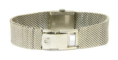 Lot 37 - A ladies' 18ct white gold diamond set Omega mechanical bracelet watch, c.1960
