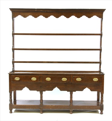 Lot 663 - An early 19th century oak dresser