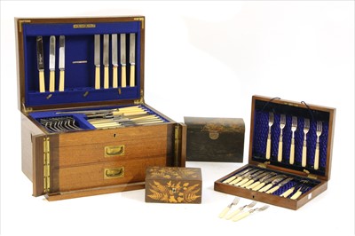 Lot 298 - An oak canteen of silver plated cutlery