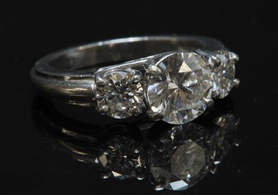 Lot 281 - A platinum three stone diamond ring