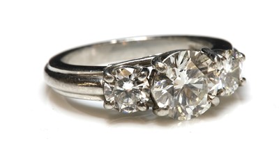 Lot 281 - A platinum three stone diamond ring