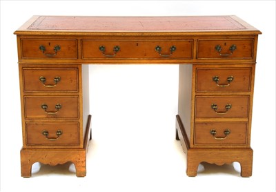 Lot 490 - A yew wood pedestal desk