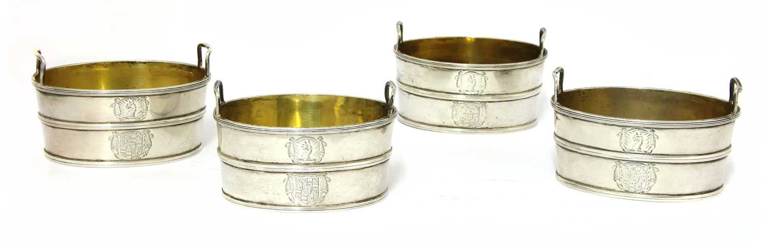 Lot 30 - A set of four twin-handled George III silver salts