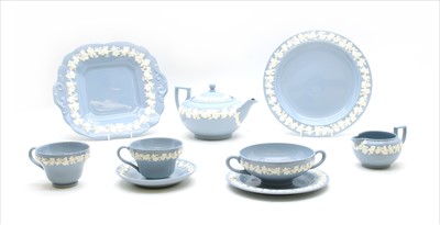 Lot 309 - A quantity of Wedgwood Queensware blue and cream dinner service