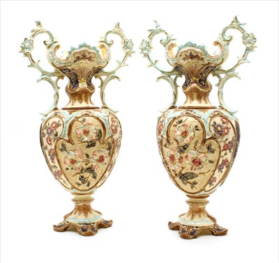 Lot 430 - A pair of continental majolica twin handled vases