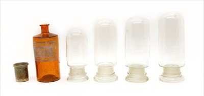 Lot 362 - A set of four graduated glass pharmaceutical display bottles