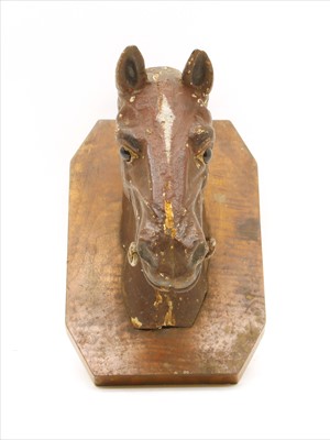 Lot 363 - A cast iron folk art horse head wall mount