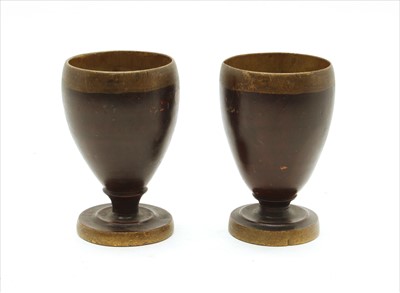 Lot 386 - A pair of turned treen goblets