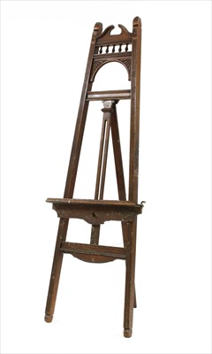 Lot 651 - An Edwardian walnut easel