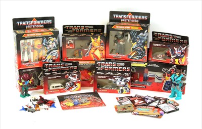 Lot 245 - A collection of Transformer toys