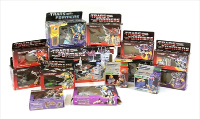 Lot 245 - A collection of Transformer toys