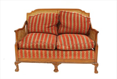 Lot 620 - A 19th century mahogany two seater bergere settee