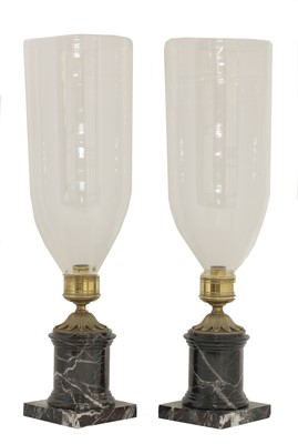 Lot 694 - A pair of hurricane lamps