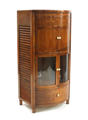 Lot 560 - A 'Starbay Cuba' rosewood finish bowfront bar cabinet