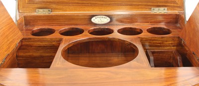 Lot 560 - A 'Starbay Cuba' rosewood finish bowfront bar cabinet