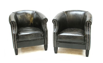 Lot 450 - A pair of modern black leather and polished metal nailed tub armchairs (2)