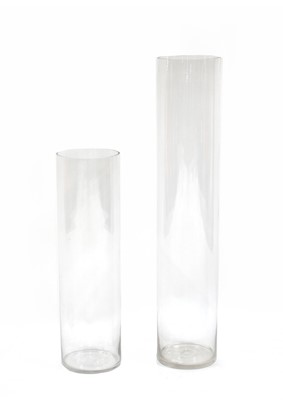 Lot 185 - A pair of graduated tall glass vases