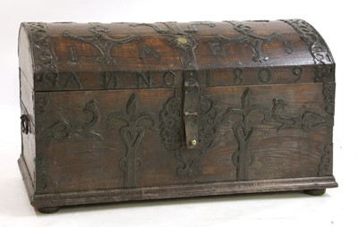 Lot 184 - A large oak dome-topped chest