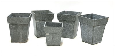 Lot 1240 - Two pairs of galvanised planters and a square block