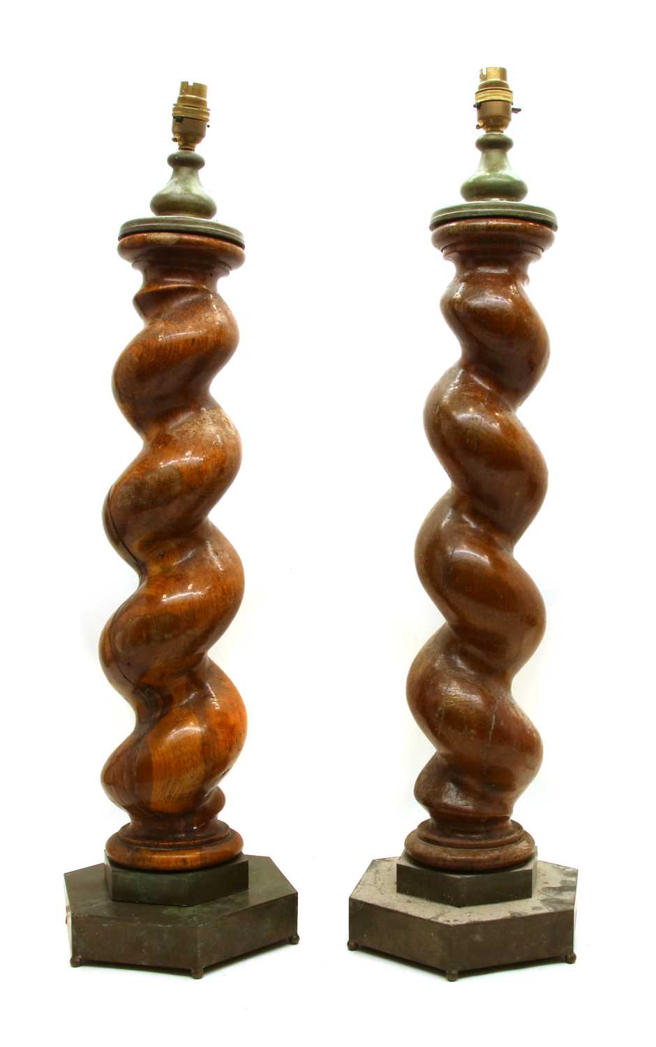 Lot 281 - A pair of walnut barley-twist carved column lamps