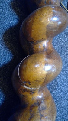 Lot 281 - A pair of walnut barley-twist carved column lamps