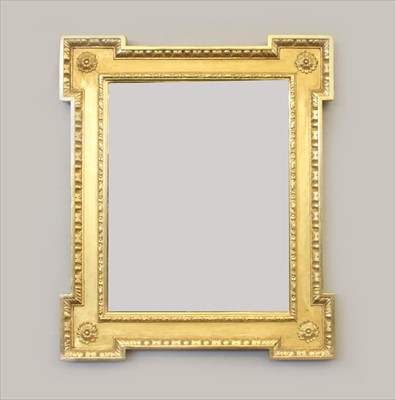 Lot 605 - A carved and giltwood mirror