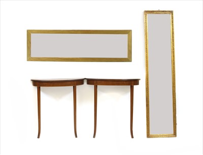 Lot 599 - Two gilt framed horizontal wall mirrors