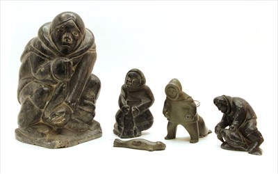 Lot 394 - A group of Inuit soapstone figures