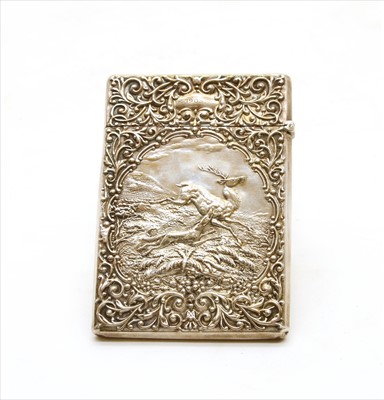 Lot 32 - An embossed silver card case