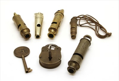 Lot 83 - Five metal whistles