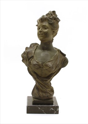 Lot 227 - An Art Nouveau earthenware bust of a lady