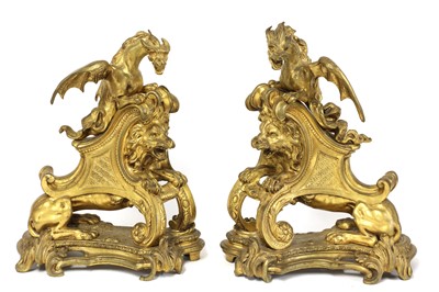 Lot 519 - A pair of gilt metal figural andirons