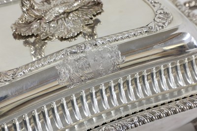 Lot 3 - A pair of Georgian silver entrée dishes and covers on heated stands