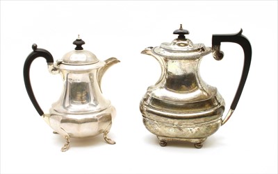 Lot 140 - Two silver hot water jugs