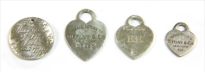 Lot 85 - Four silver Tiffany & Co. tags
