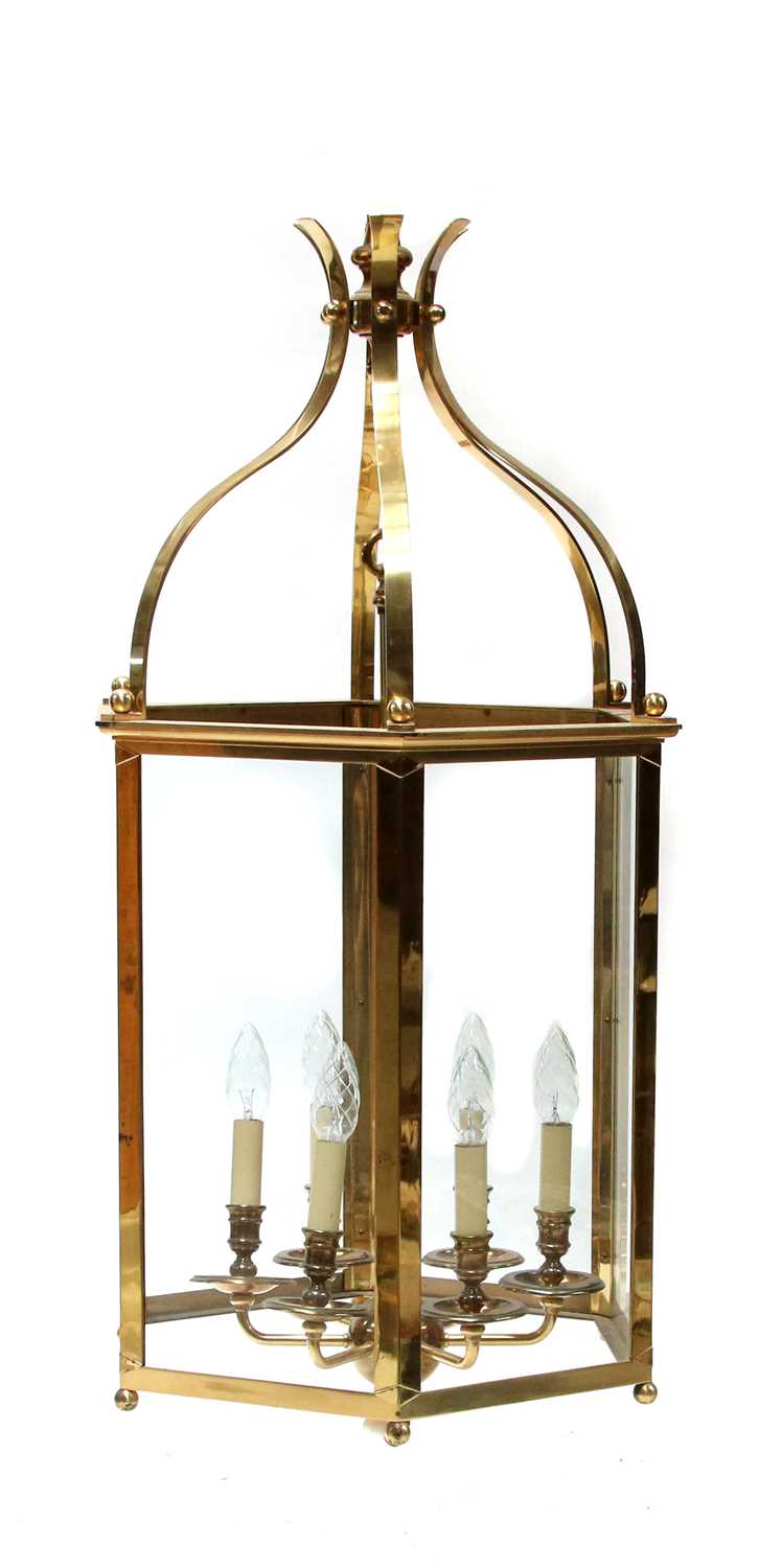 Lot 305 - A large brass-framed hexagonal six-light hall lantern