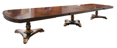 Lot 319 - A very large George III-style mahogany and parcel-gilt dining table