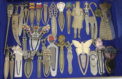 Lot 125 - Twenty eight base metal bookmarks and paper knives
