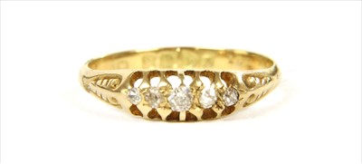 Lot 21 - An 18ct gold boat shaped five stone diamond ring