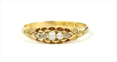 Lot 18 - A Victorian 18ct gold boat shaped five stone diamond ring