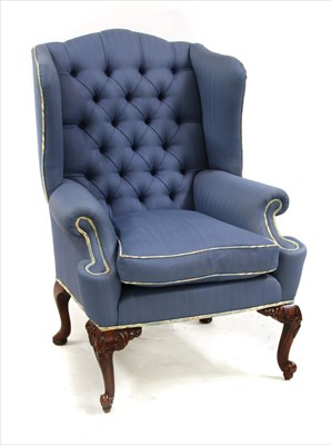 Lot 508 - A Georgian style mahogany wing armchair