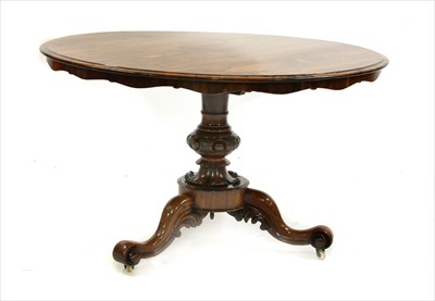 Lot 477 - A Victorian rosewood pedestal centre table