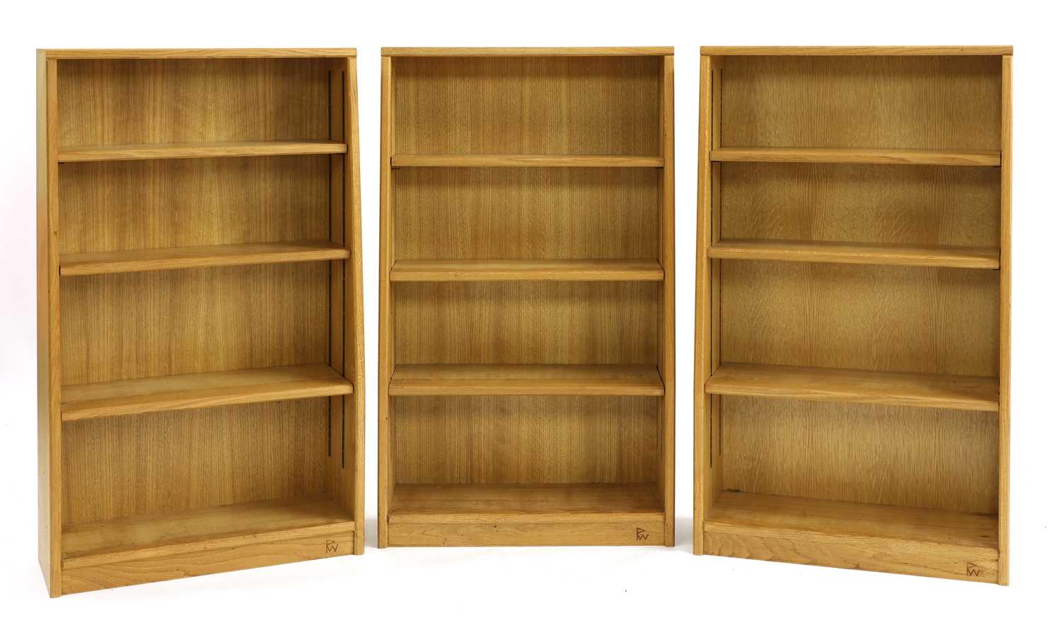 Lot 272 - A set of three oak open bookcases