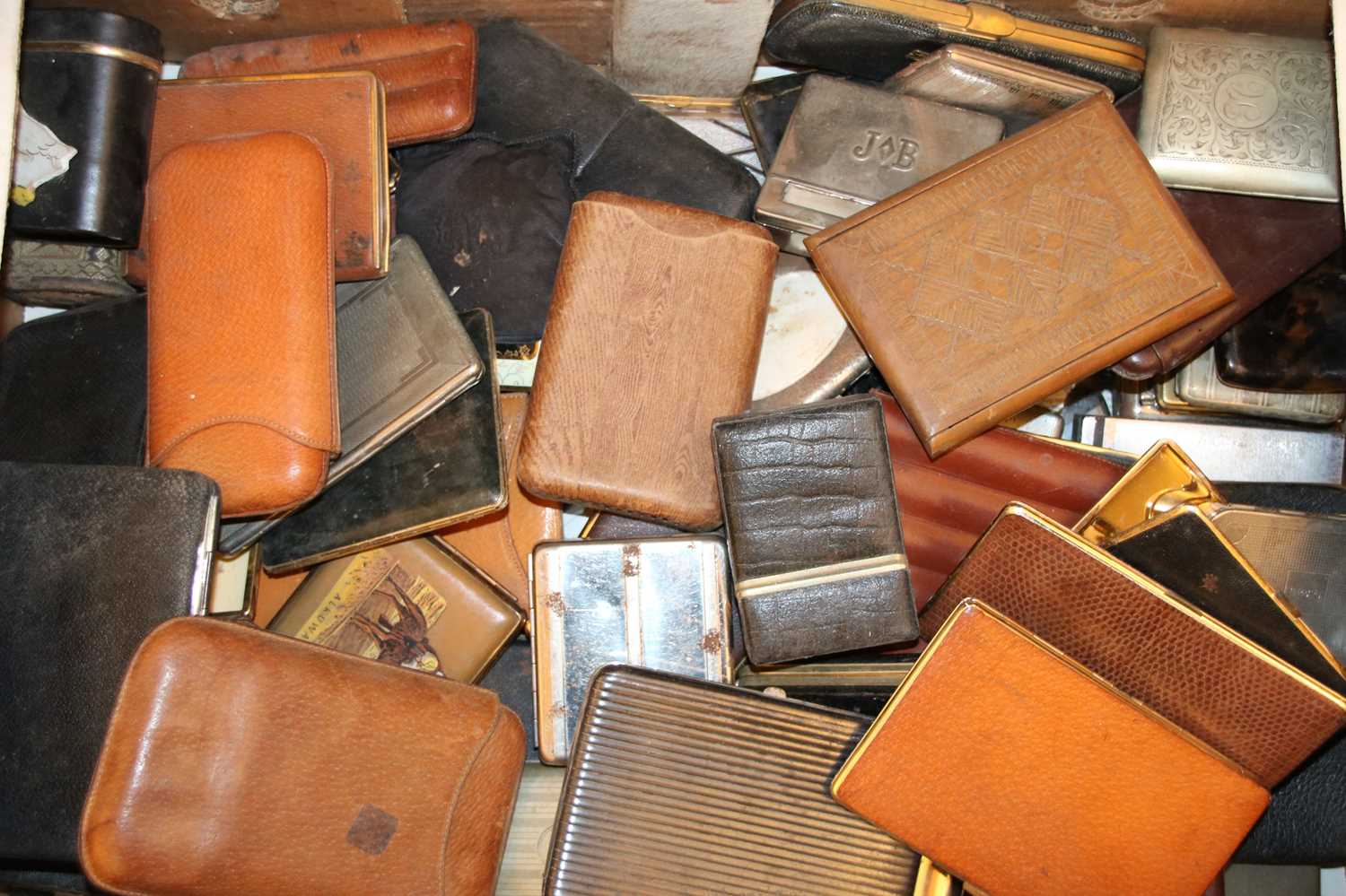 Lot 84 - A collection of mixed cigar and cigarette cases and pouches