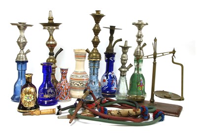 Lot 151 - A collection of Middle Eastern hookah water pipes