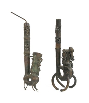 Lot 170 - Two massive African tribal cast pipes