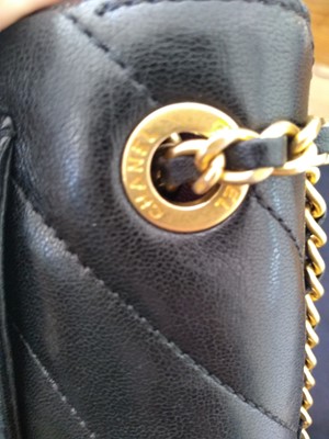 Lot 410 - A Chanel black chevron flap bag