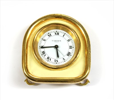 Lot 195 - A Cartier gilt metal travel alarm clock