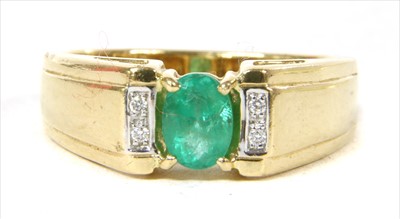 Lot 45 - An 18ct gold emerald and diamond ring